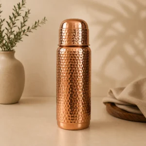 Hand hammered copper water bottle with cup lid