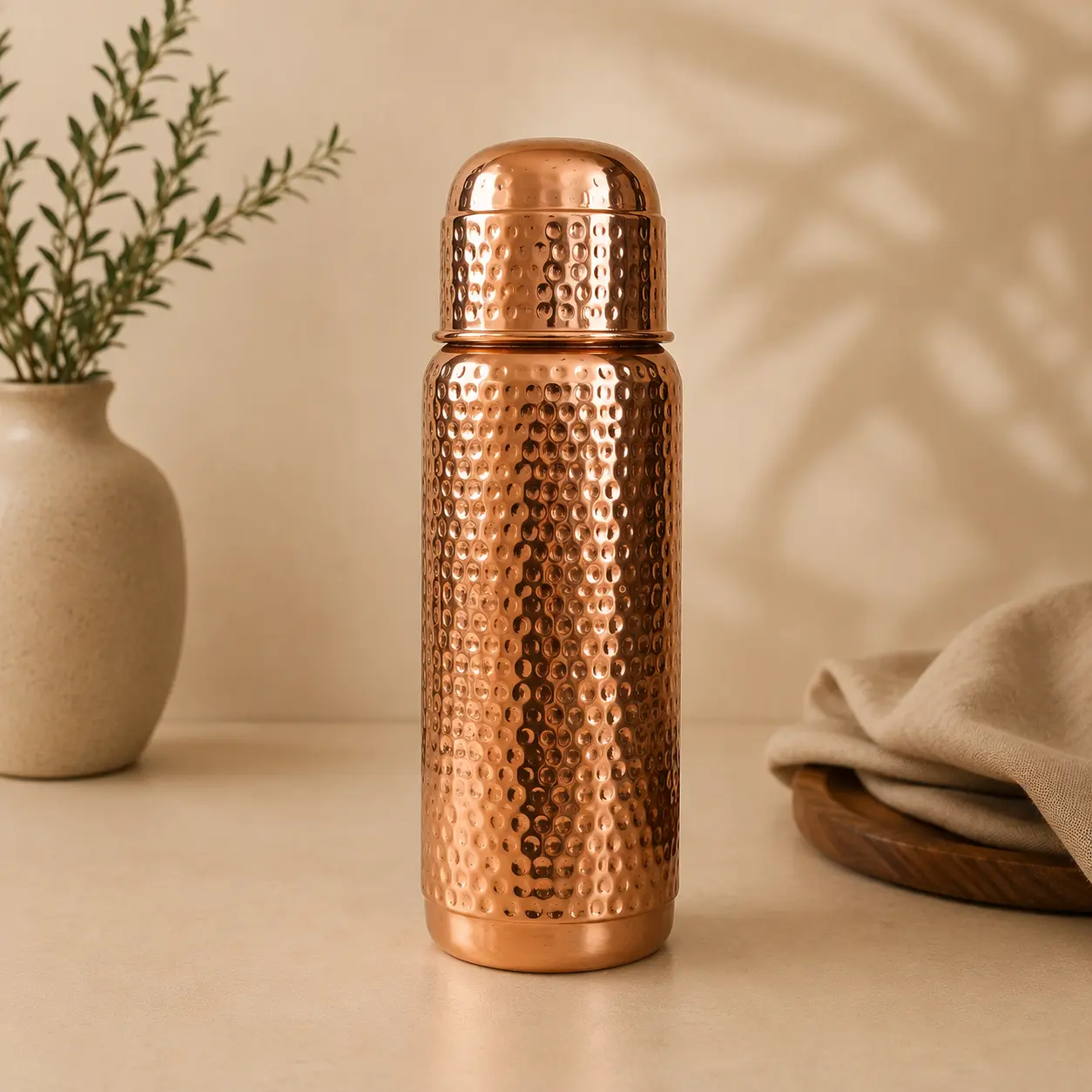 Hand hammered copper water bottle with cup lid