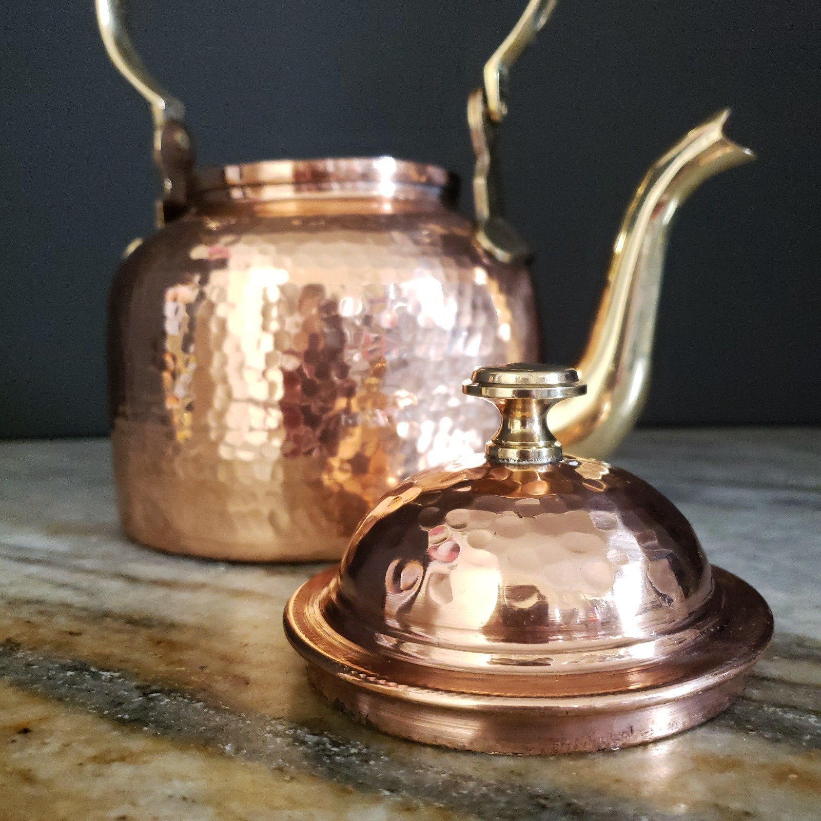 Copper tea kettle with brass spout and lid